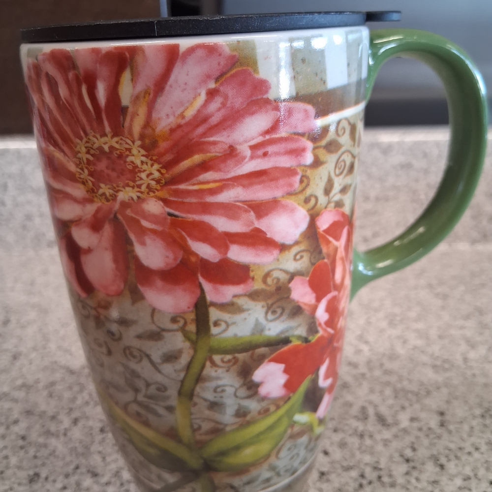 Floral Ceramic Travel Mug with Green Handle and Black Lid